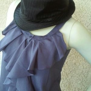 Ruffled purple strapped blouse with criss cross st