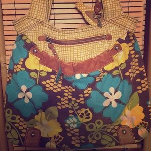 Like new Fossil brown purse with floral pattern