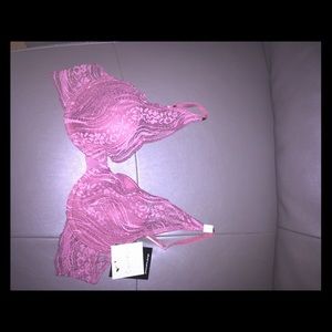 Calvin Klein provocative plunge in deep mauve 36b