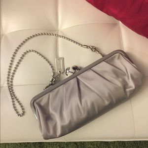 New condition satin coach purse