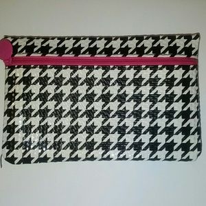 Black, white, and pink ipsy bag
