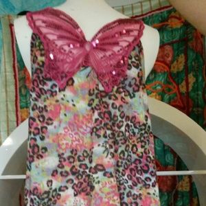 So cute ! Butterfly back tank .