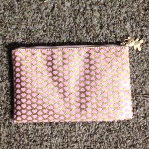 Too Faced pink and gold cosmetic bag