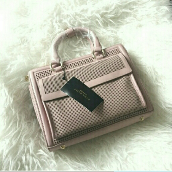 Zara Handbags - Zara light pink perforated city bag purse