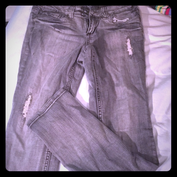 Grey and black skinny jeans