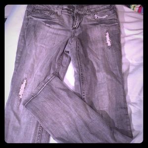 Grey and black skinny jeans