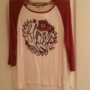 Adorable red flower child shirt.