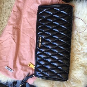 Authentic Miu Miu leather clutch