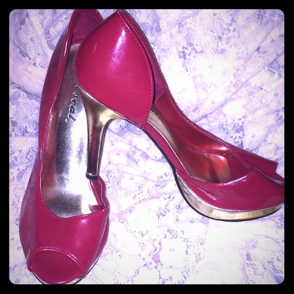 Red peep toe pumps