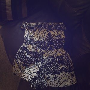 Black and white patterned jumper.