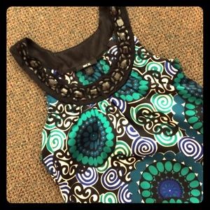 Colors and bedazzling, great top