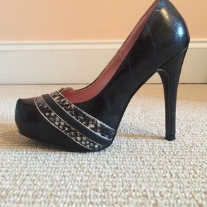 Lollipop black pumps with snake print detail
