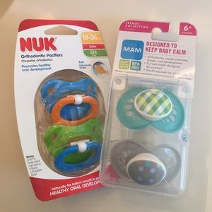 BRAND NEW BABY PACIFIERS