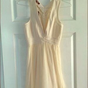 Off white deep v dress size medium.