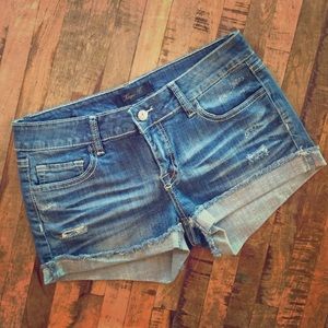 Distressed denim shorts