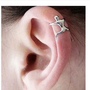 Hanging man ear cuff and two other cuffs