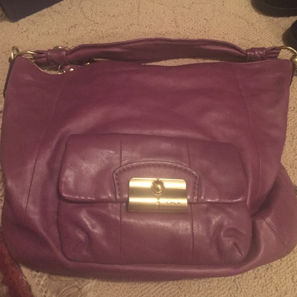 Coach handbag with brass trim
