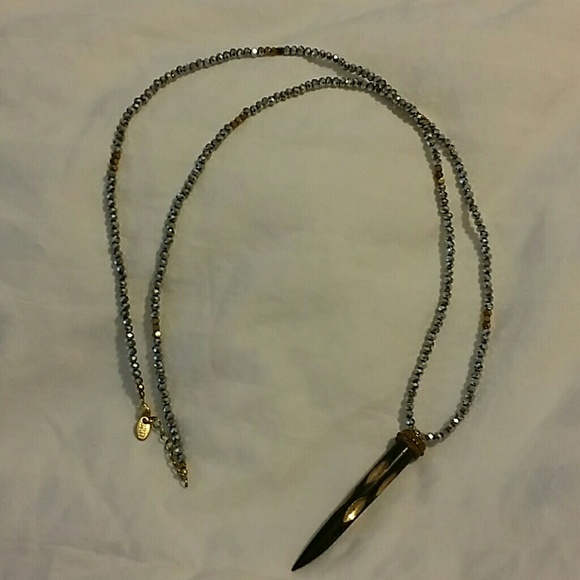 Silver and gold bead necklace with small horn pend