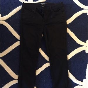 Bebe Mid Rise skinny jeans