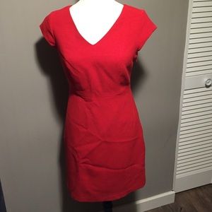 The Limites size 2 red shirt sleeve dress.