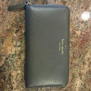 Brand new never used grey Kate spade wallet