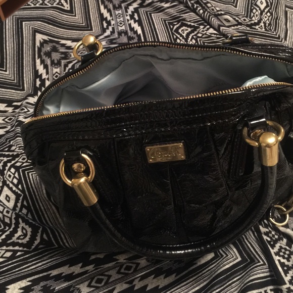 Coach black shine with blue satin interior