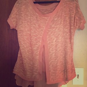Pink open back sweater shirt.