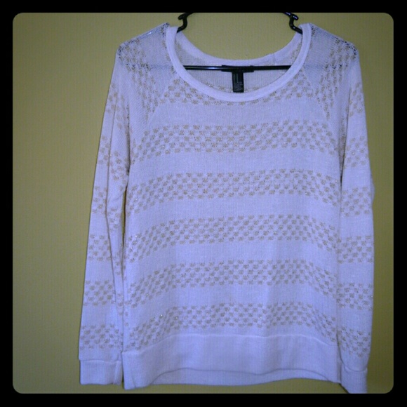White and gold sweater
