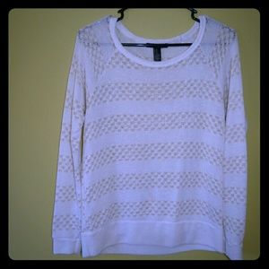 White and gold sweater