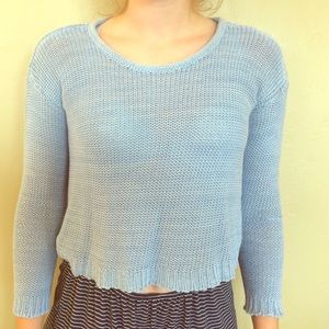 light blue sweater