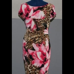 Very flattering and sexy dress by Caché