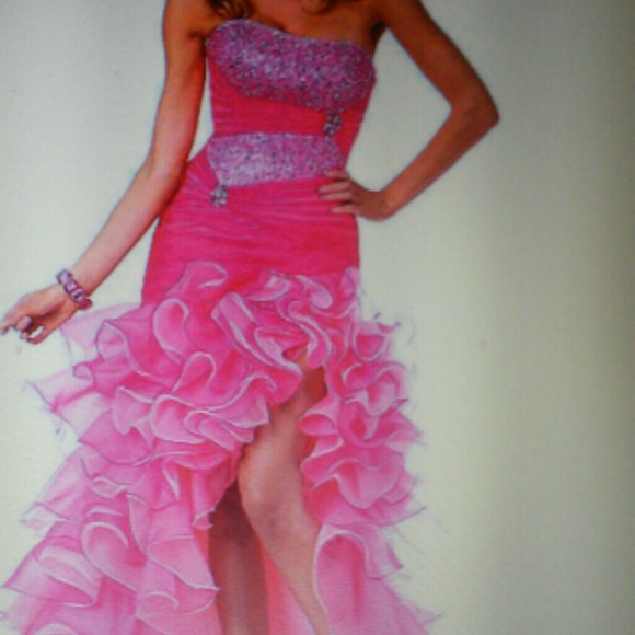 High Low gown with ruffles on skirt and train.