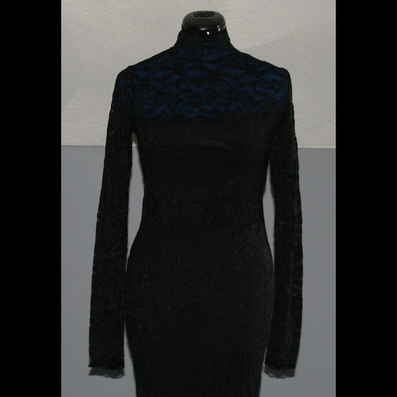 Black Lace Dress with black lining, open back.