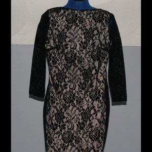 Lacy dress with open back