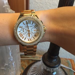 Gold with diamond embezzlement Michael Kors watch