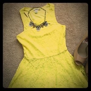 Bright yellow lace skater dress