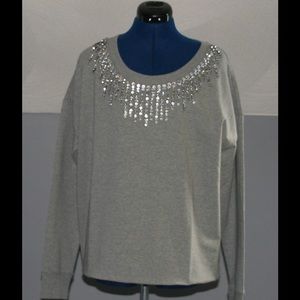 Jeweled sweatshirt.