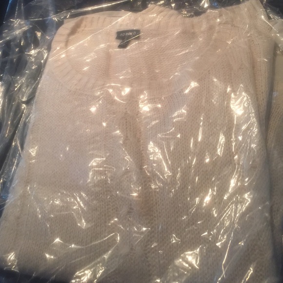 layered cream sweater