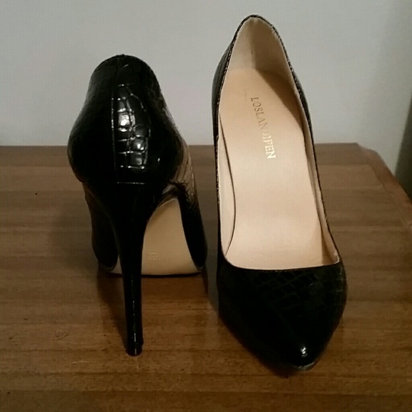 Black pointed toe heels