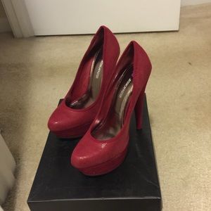 Red high heel pumps