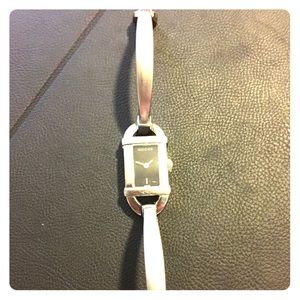 Authentic Gucci small dial, stainless steel watch.