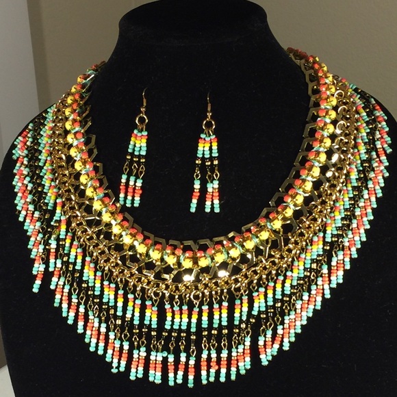 Hand beaded necklace with matching earrings.