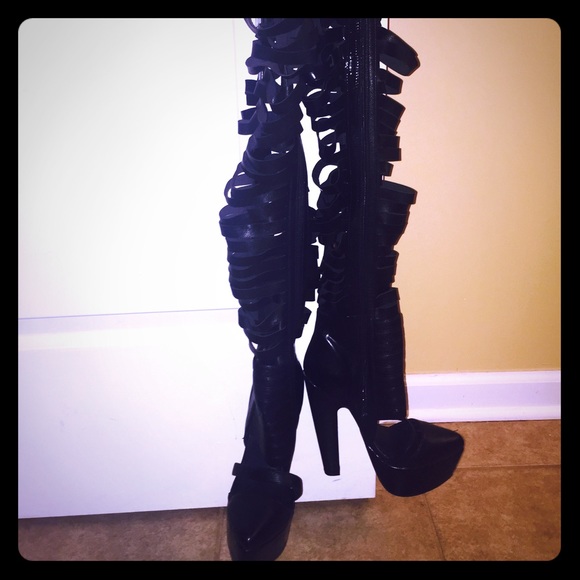Jeffrey Campbell Gashed Thigh high boots.