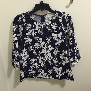 Modcloth navy blue shirt with white flowers.