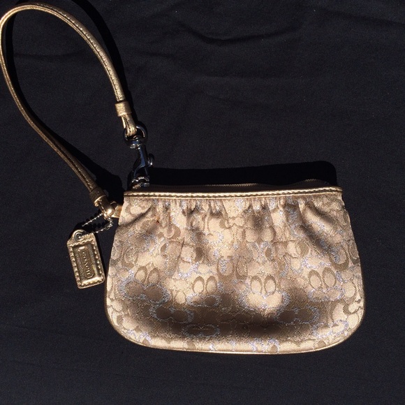 Coach Handbags - COACH Wristlet - Gold