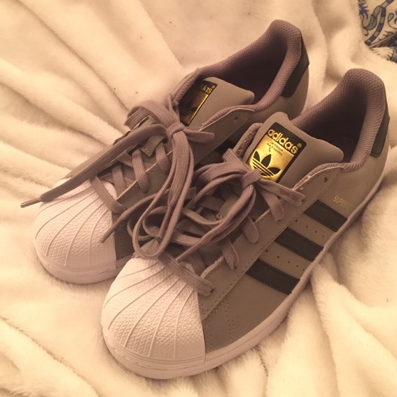 Brand new Adidas Superstar sneakers.