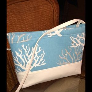 NWOT hand crafted. Aqua/off white shoulder bag.
