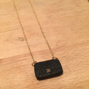 Adorable Chanel bag necklace! Really cute.