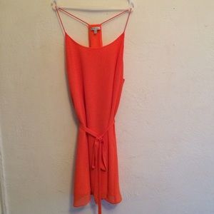 Orange racerback dress with tie belt