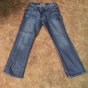 Men's buckle dark wash jeans. New. Size 30